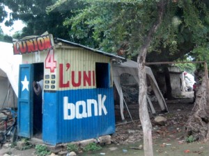 Lottery ticket boutiques are colloquially referred to as a "banks," because they will take "investment" wagers as small as a single goude.  This "bank" is on the outskirts of Croix-des-Bouquets.