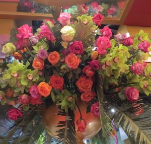 Roses and orchids in a brilliant array of color.