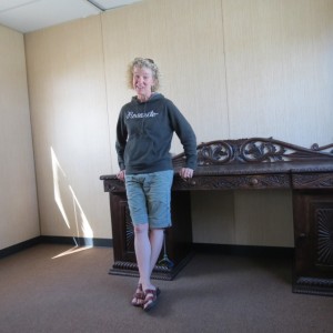Casey in the new retail office of It's Cactus, your online source for the finest in folkart
