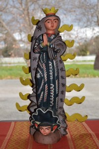 Guatemalan wood carving of Our Lady of Guadalupe.