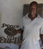 Haitian Metal Artist Claudy Soulouque with his Peace on Earth design.